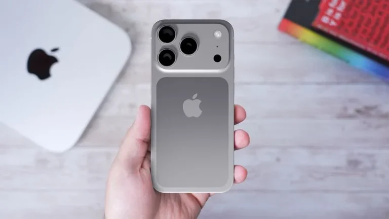 A person holding the iPhone 17 Pro Max, highlighting its new triple-lens camera design and sleek rear finish—representing one of the phone’s key hardware upgrades.
